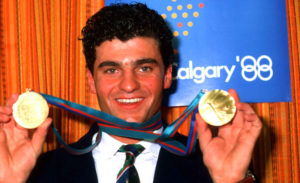 Pravi proboj među zvezde Tomba je doživeo u Kalgariju na Olimpijskim igrama 1988. kada je osvojio zlata i u slalomu i u veleslalomu, pobedivši svog idola Ingemara Stenmarka. Jedini neuspeh u Kanadi mu je bio što je prelepu nemačku klizačicu Katarinu Vit javno pozvao na večeru, ali je bio glatko odbijen.